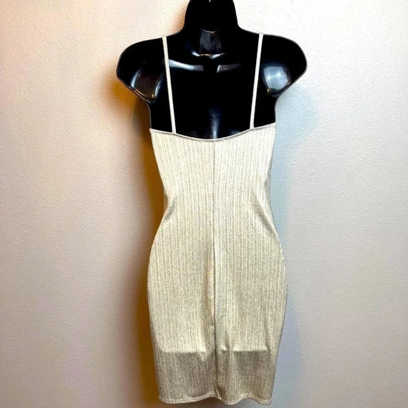 Fashion Nova metallic gold bodycon dress with tulip flap detail in front. - Picture 8 of 11